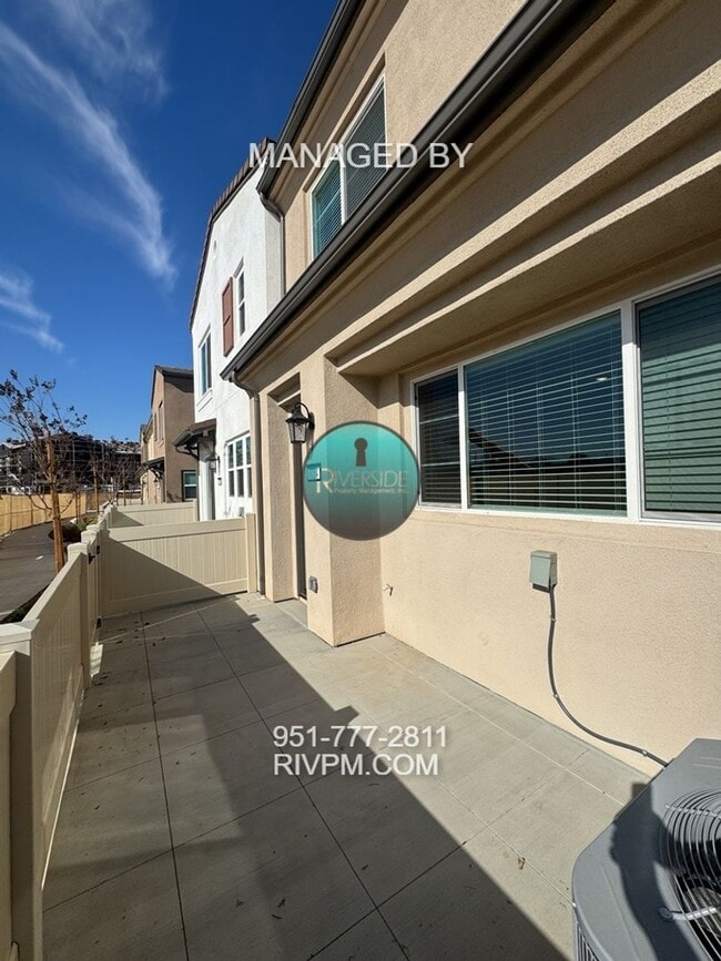 Building Photo - New Build Gem! Modern Three-Bedroom Condo with Bright Open Layout & Patio – Available Now!