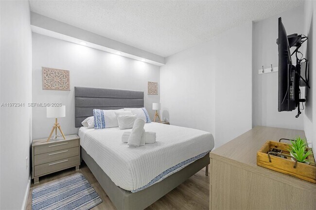 Building Photo - 19370 Collins Ave