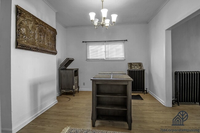 Building Photo - Furnished 2-Bedroom First-Floor Apartment Near Elmwood Village