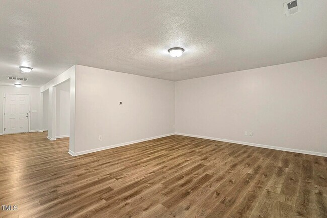Building Photo - Earn Wealth While Leasing - Like a Homeown...