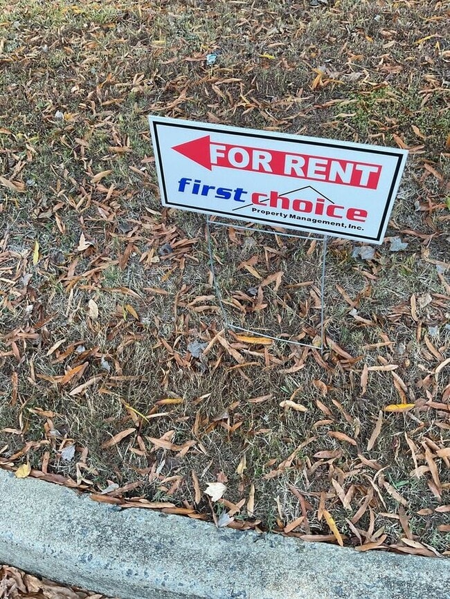 Building Photo - Just off the main road, but in walking dis...