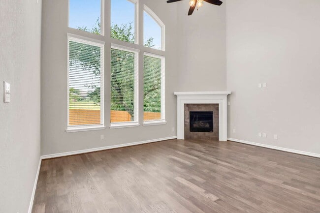 Building Photo - "Spacious 4-Bedroom Sanctuary with Cozy Fireplace in San Antonio's Prime Location!"