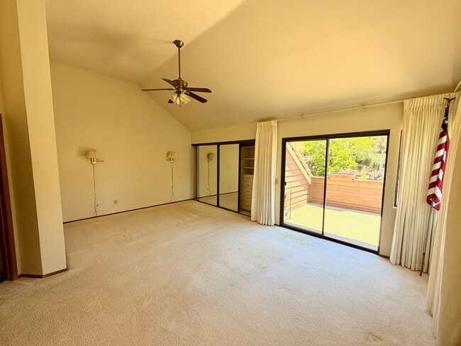 Building Photo - Private Oasis with Sunroom, Balcony & Lush Landscaping | 4BR Home Near Community Pool & Spa