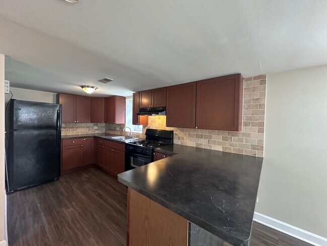 Building Photo - 3301 N Ozanam Ave