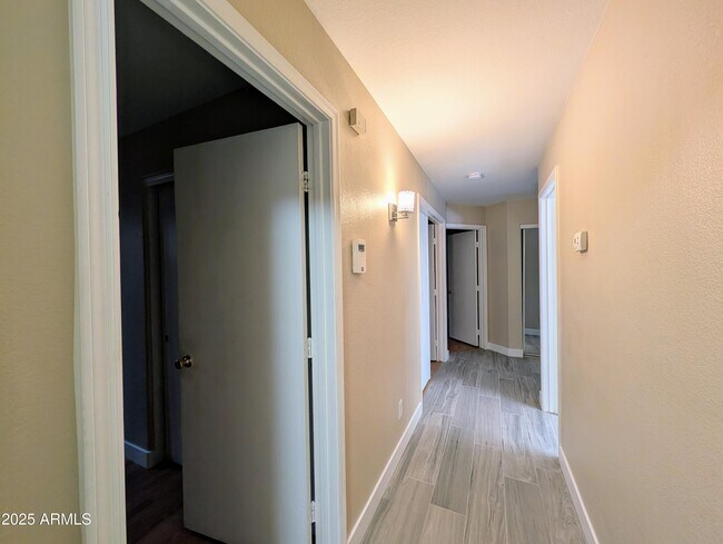 Building Photo - 7059 W Gardenia Ave