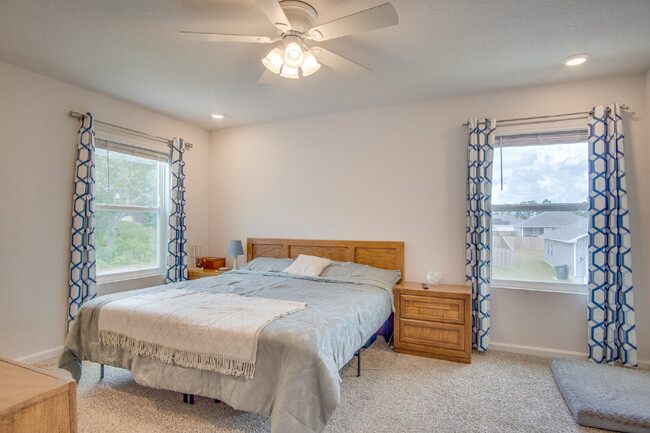 Building Photo - Spacious 4BR Home with 2-Car Garage Near M...