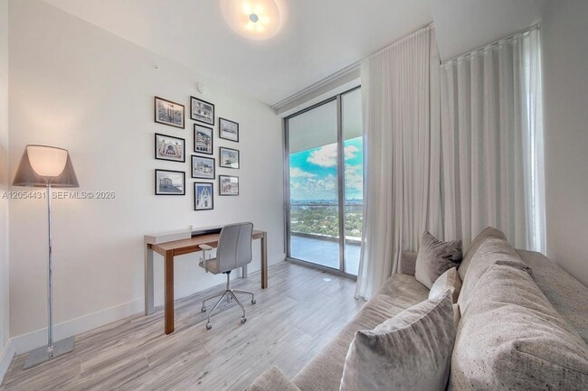 Building Photo - 10203 Collins Ave