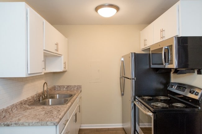 Building Photo - Condos at Villager