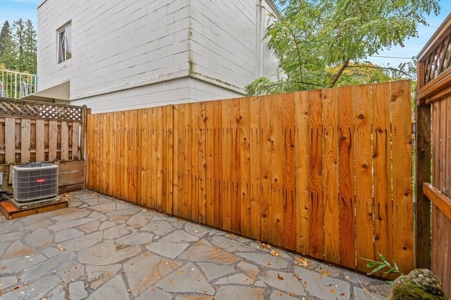 Building Photo - $500 move-in special! Unique 2-bdrm/2.5-bath duplex w/ A/C—Private patio, storage, garage w/ wash...