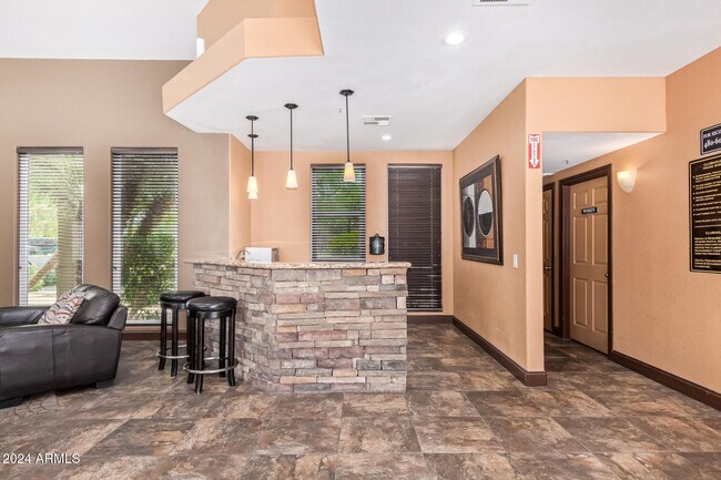 Building Photo - 9450 E Becker Ln