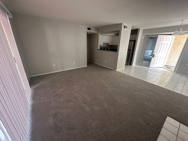 Building Photo - 2 Bedroom 2 bath condo with a den ready for move in!! Ask about our promotion!!