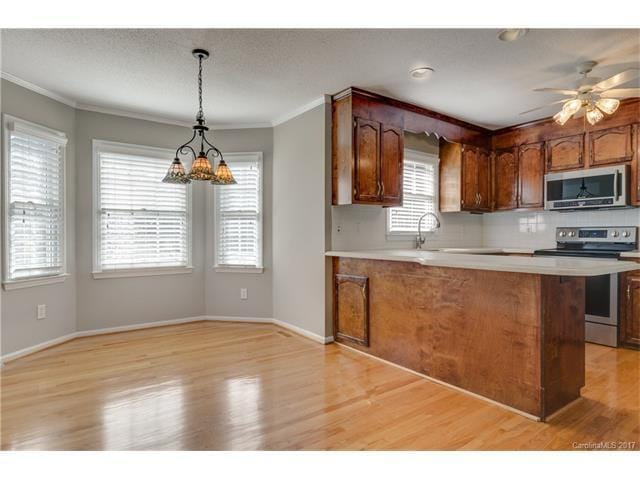Building Photo - "Charming 4-Bedroom Retreat in Gastonia with Granite Touches & Gleaming Hardwoods!"