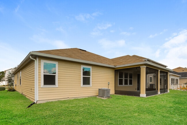 Building Photo - Home with Pond Views & Screened-In Patio