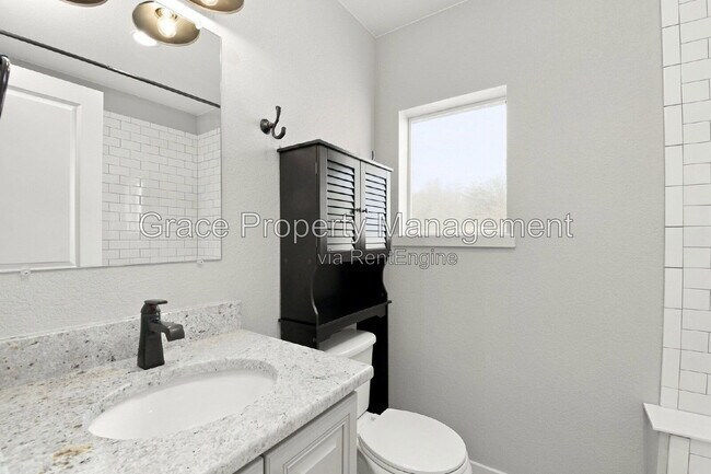 Building Photo - 1658 W 66th Ave