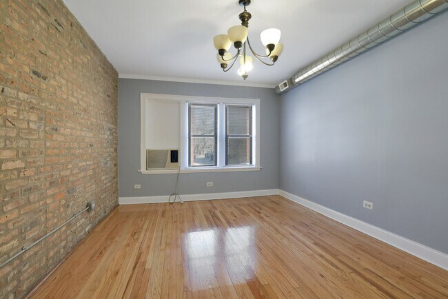 Building Photo - 7601 S Emerald Ave