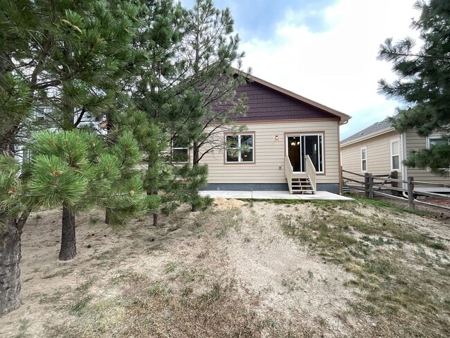 Building Photo - 4 Bedroom Home Available Near Woodmoor Dr ...