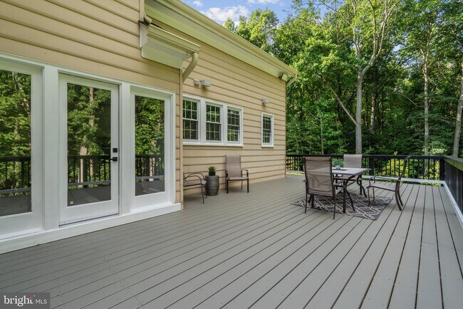 Building Photo - 10899 Woodland Falls Dr