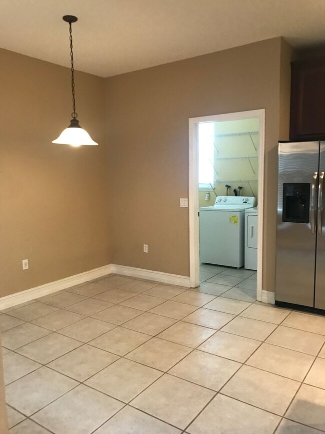 Building Photo - MOVE IN SPECIAL- Charming 3/2 home w/ formal office/4th bedroom and fenced yard in Harmony