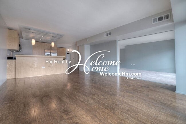 Building Photo - Coming Soon - Downtown High-rise Montage A...