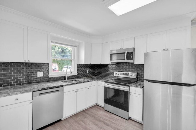 Building Photo - Spacious 4-Bedroom, 2.5-Bath Home – West E...