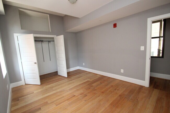 Building Photo - 211 W Lanvale St