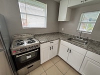 Building Photo - 1064 N Tamiami Trl