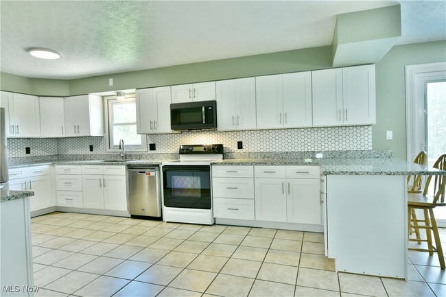 Building Photo - 5794 Merwin Chase Rd