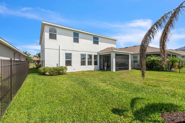 Building Photo - Spacious 5-Bedroom Home with Resort-Style ...