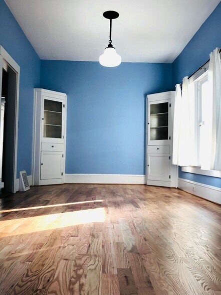 dining room with built ins and gleaming hardwoods - 5336 SE 44th Ave