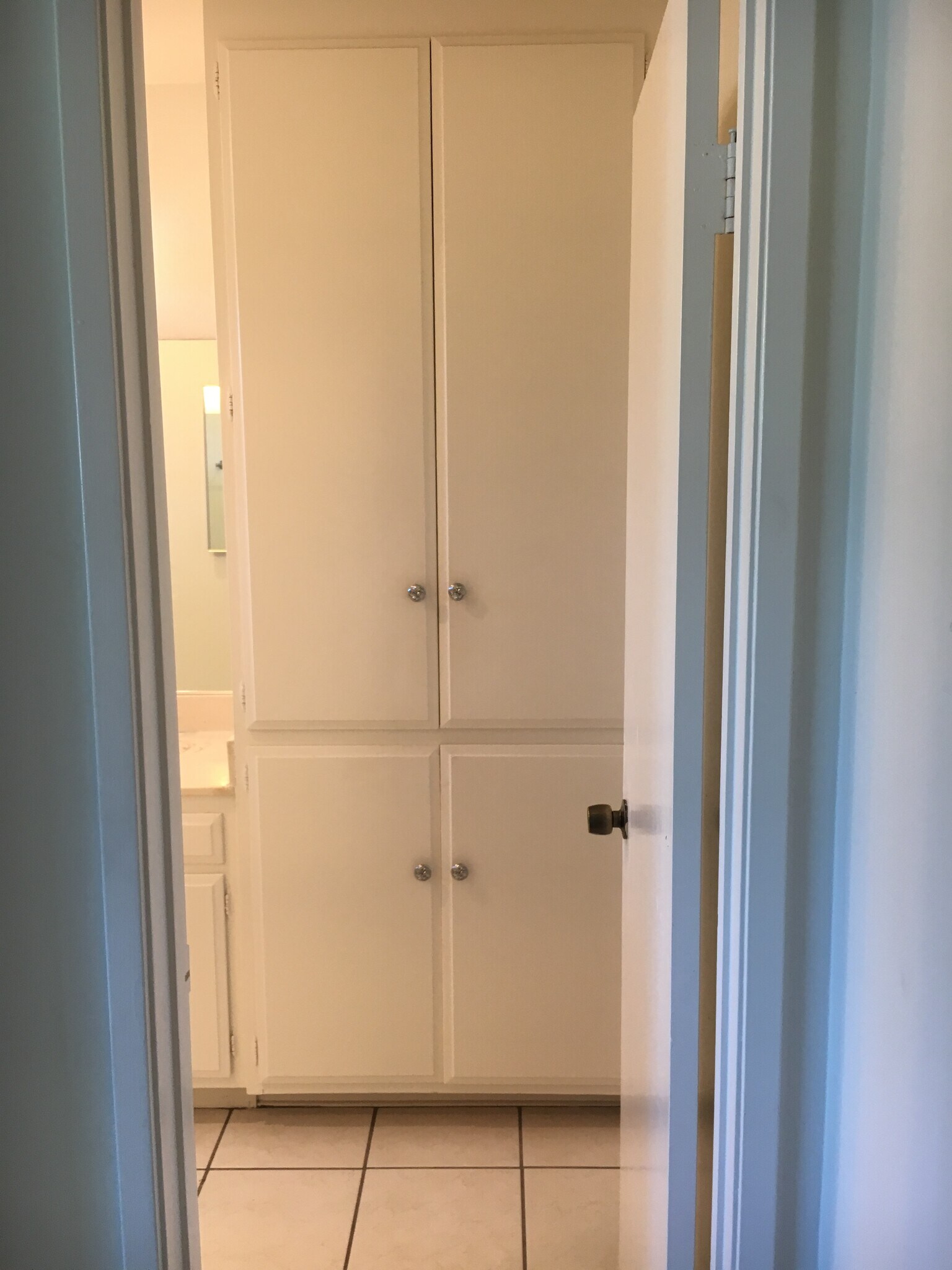 Linen cabinet in bathroom - 18630 Del Rio Pl