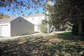 outside of house, surrounded by yard and green space - 538 Strachan Dr