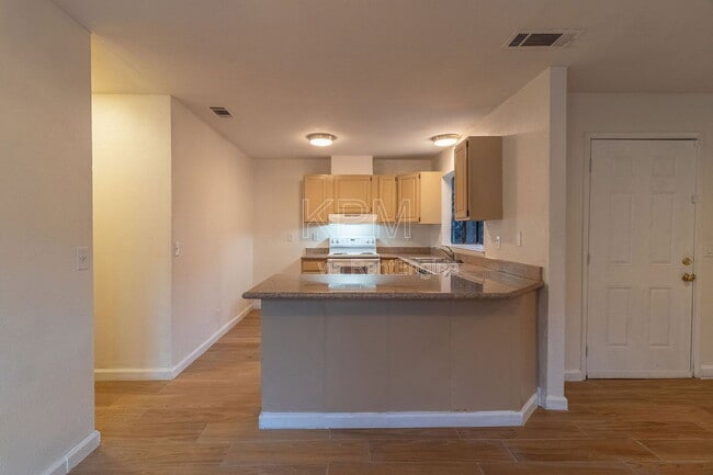 Building Photo - 7409 Village Green Dr