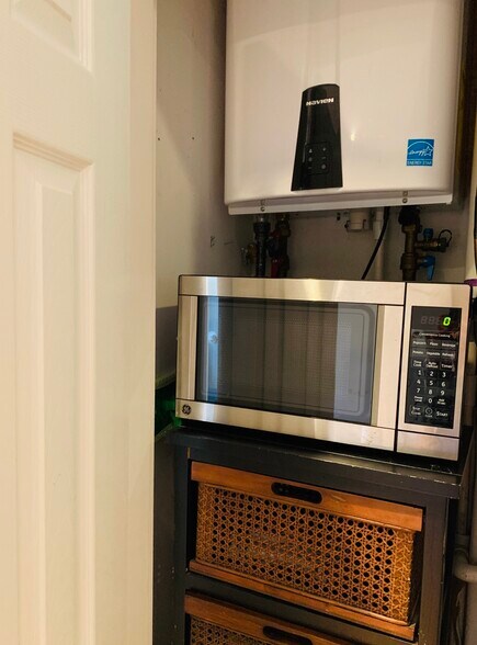 Tankless water heater (never out of hot H2O) - 2227 10th St NW