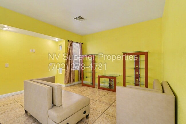 Building Photo - NW!! 4 Bedrooms!!! All Tile and Pergo flooring T/O!! NO Carpet!!! Low Maintenance Desert landscap...