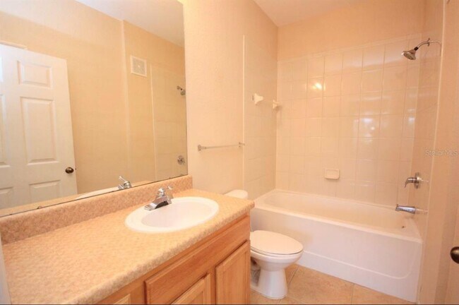 Building Photo - 10213 Courtney Palms Blvd