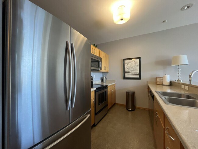 Building Photo - Top-Floor Pearl District Condo with Floor-to-Ceiling Windows, Courtyard Views & In-Unit Washer/Dryer