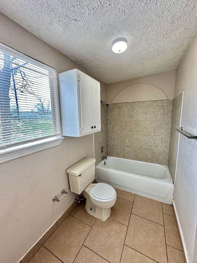 Building Photo - COMING MAY 2026 - Spacious & Centrally Located 3-Bedroom 2-Bathroom Home!