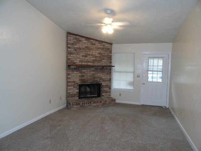 Building Photo - SPACIOUS 2/2 w/ Washer/Dryer (as-is), Sunroom, Fireplace, & More! Available March 1st for $1050/m...