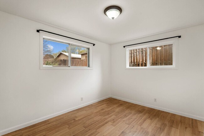 Building Photo - 4 Bedroom Home with Covered Parking & Fenced Backyard