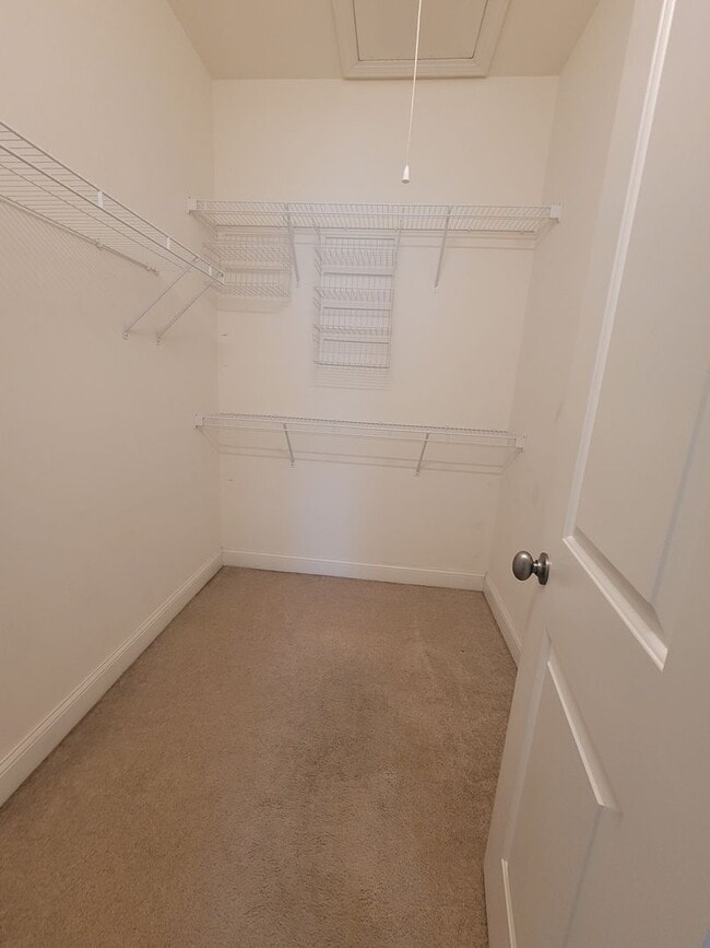 Building Photo - This 3 bedroom 2.5 bath brick townhouse with one car garage is located in Westgate Shoreline subd...
