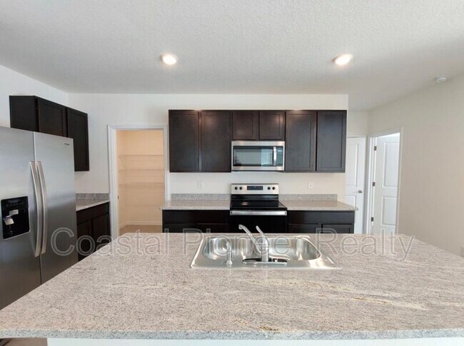 Building Photo - 34260 Jasper Stone Dr