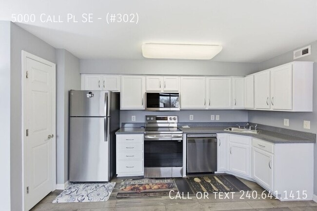 Building Photo - 5000 Call Pl SE