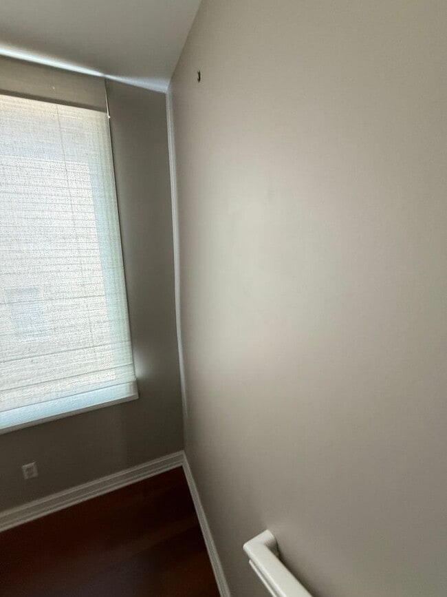 Building Photo - Spacious Condominium