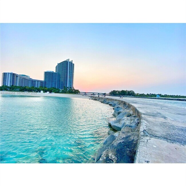 Building Photo - 10275 Collins Ave