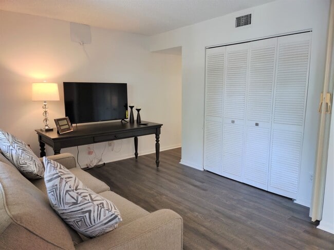 Building Photo - Bird Bay Village Annual Rental – Furnished 1st Floor Unit with Covered Parking