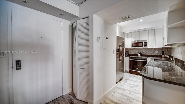 Building Photo - 2401 Collins Ave