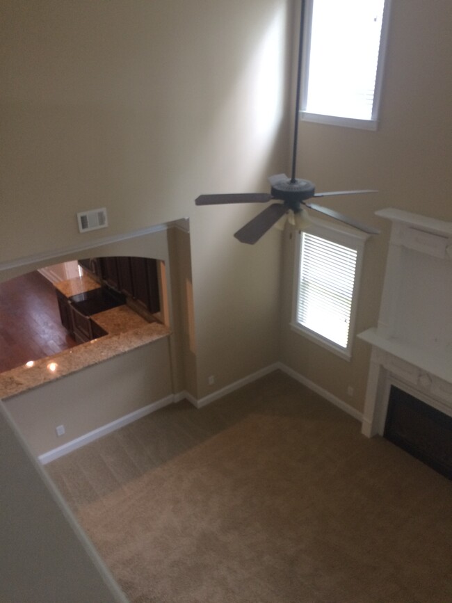 Living room/kitchen view as seen from upstairs catwalk - 319 Haywood Dr