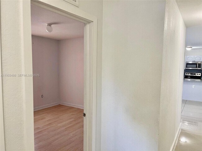 Building Photo - 5857 NW 13th Ave