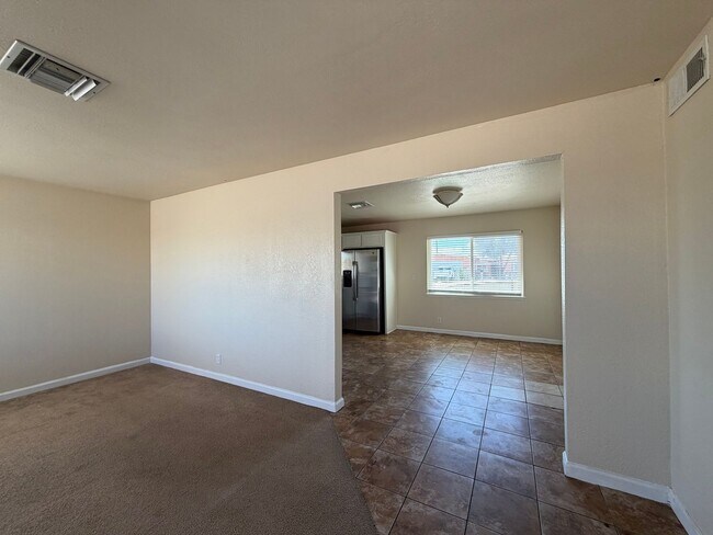 Building Photo - 3 Bedroom 2 Bathroom House with Central A/C , 2 Car Garage and Beautiful Backyard with Covered Patio