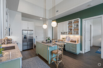 Expansive Kitchen Islands with Pantry Storage - Cortland Colburn